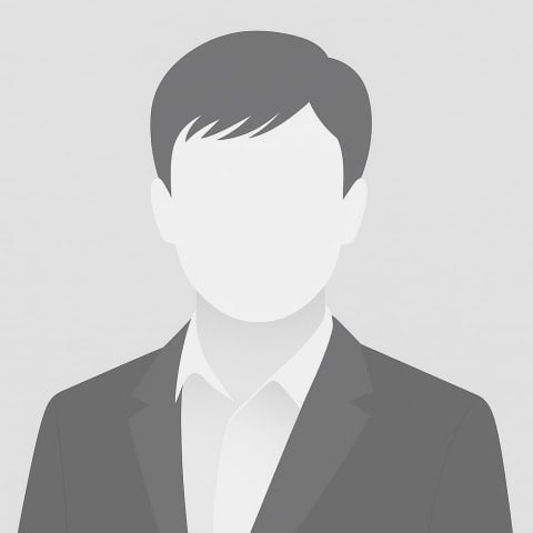 Generic grayscale portrait of a man in a suit with no facial features.
